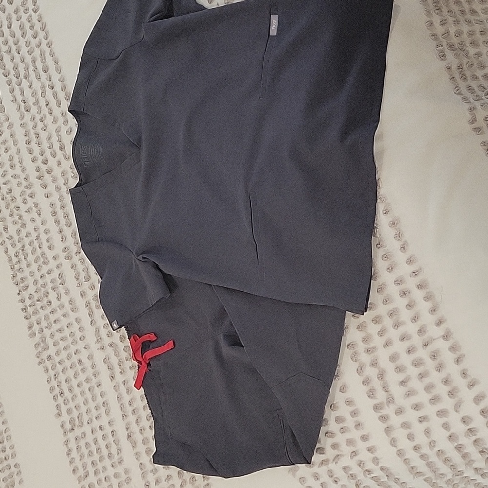Figs charcoal grey scrubs.